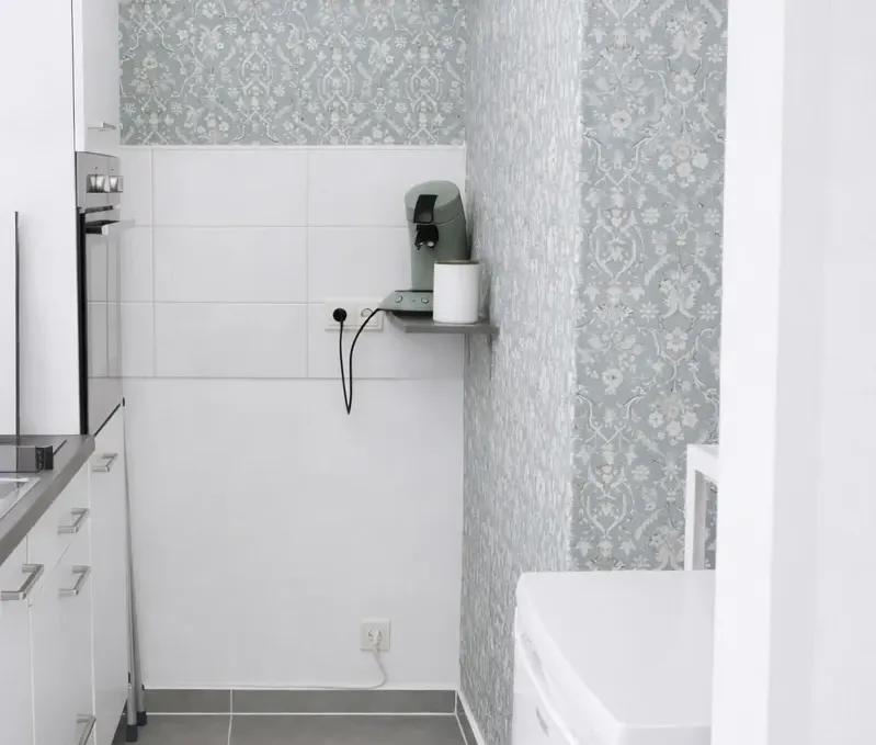 Badezimmer mit Dusche im Ferienhaus Seeblick Badezimmer im Ferienhaus Seeblick mit Dusche, WC und hellen Fliesen.